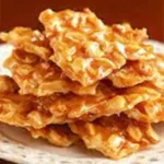 Easy microwave peanut brittle is pictured as the featured image, showcasing its golden color and tempting crunch for a quick and simple homemade candy recipe.