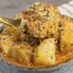 Creamy Garlic Parmesan Crockpot Chicken & Potatoes are featured in a delicious and easy slow cooker meal.