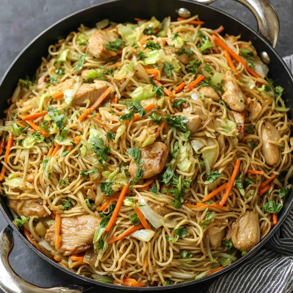 A delicious serving of Chicken Chow Mein is presented as a second enticing image in the article.