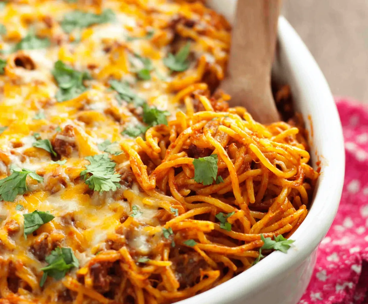 A close-up shot showcasing a delicious Southern Spaghetti Bake ready to be served.