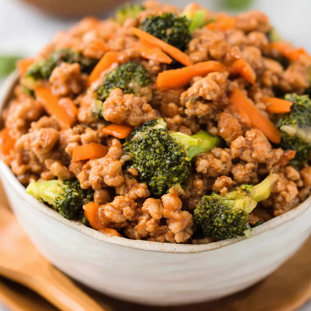 Close-up shot of freshly prepared Teriyaki Ground Chicken Bowls showcasing the savory ground chicken, rice, and vibrant vegetables.