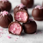 Chocolate Raspberry Truffles are beautifully displayed in this enticing featured image.